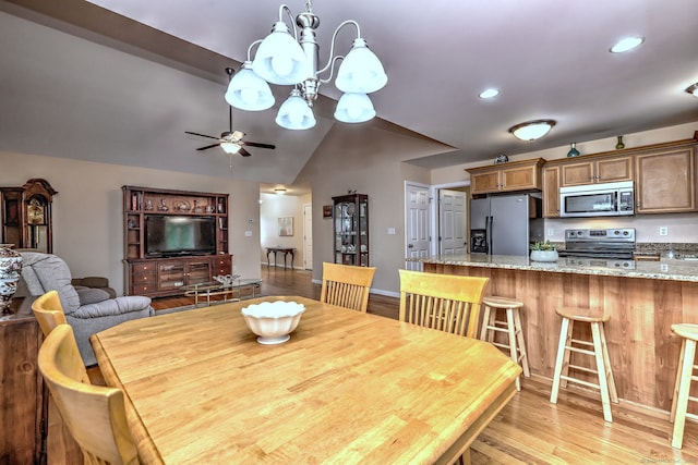 30 Prosperity Ct Unit 25, Southington, CT 06489 - dining area featuring lofted ceiling, light wood-style flooring, a ceiling fan, recessed lighting, and a chandelier