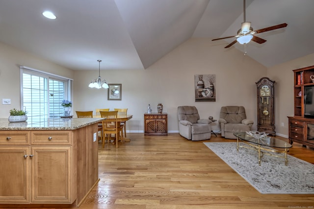 30 Prosperity Ct Unit 25, Southington, CT 06489 - living room with ceiling fan, light wood-type flooring, a chandelier, vaulted ceiling, and baseboards