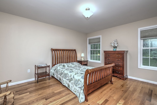 30 Prosperity Ct Unit 25, Southington, CT 06489 - bedroom featuring light wood-style flooring, multiple windows, and baseboards