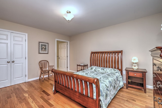 30 Prosperity Ct Unit 25, Southington, CT 06489 - bedroom featuring light wood finished floors, baseboards, and a closet
