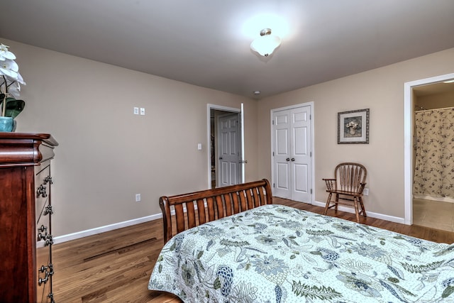 30 Prosperity Ct Unit 25, Southington, CT 06489 - bedroom with baseboards, wood finished floors, and ensuite bathroom