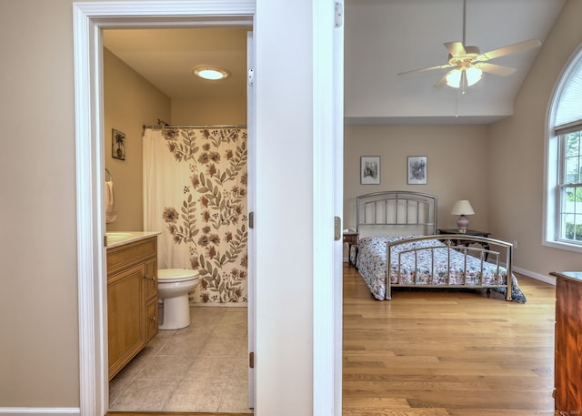 30 Prosperity Ct Unit 25, Southington, CT 06489 - bedroom featuring ensuite bath, light wood finished floors, baseboards, and a ceiling fan