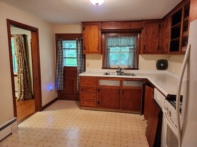 79 Pomfret Rd, Brooklyn, CT 06234 - kitchen featuring a sink, a baseboard radiator, light countertops, and white appliances