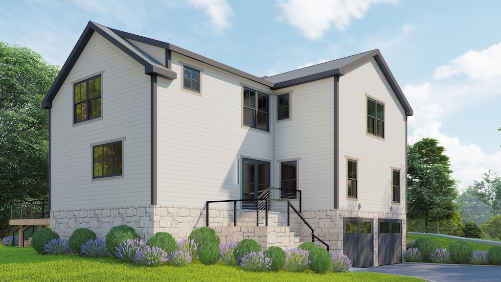 exterior space featuring stone siding, driveway, a garage, and stairs