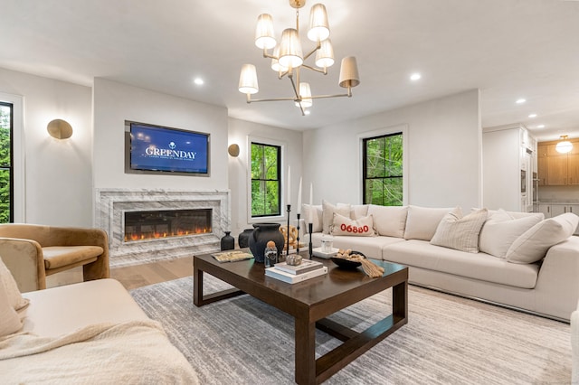26 Hitchcock Rd, Westport, CT 06880 - living room featuring wood finished floors, a fireplace, recessed lighting, and a chandelier