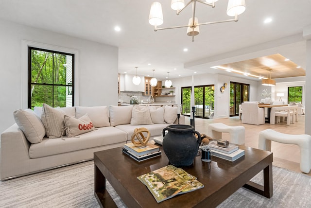 26 Hitchcock Rd, Westport, CT 06880 - living room with plenty of natural light, recessed lighting, a chandelier, and a raised ceiling