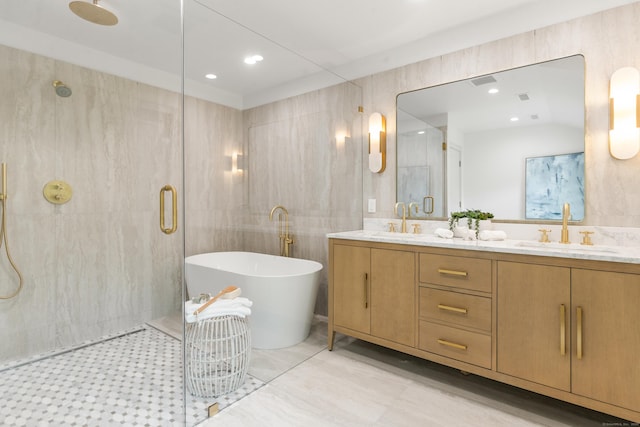 26 Hitchcock Rd, Westport, CT 06880 - full bathroom with a shower stall, double vanity, a soaking tub, tile walls, and recessed lighting