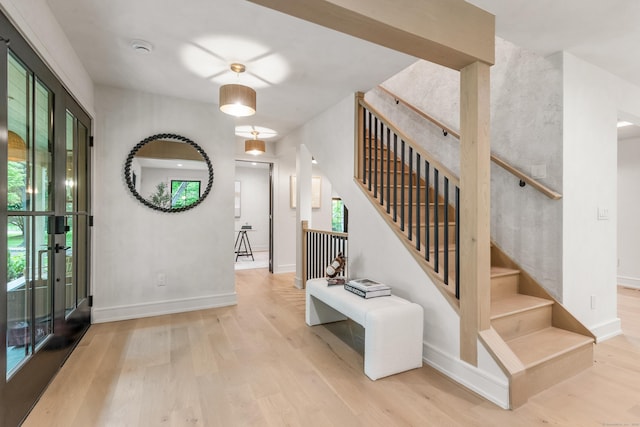 26 Hitchcock Rd, Westport, CT 06880 - entrance foyer with wood finished floors and stairway