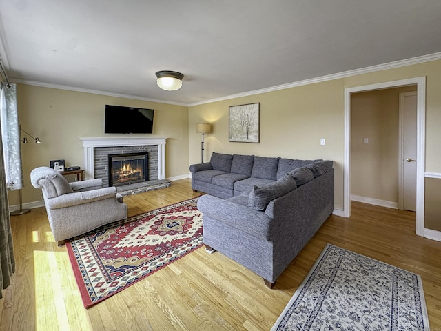 870 Lakeside Dr, Bridgeport, CT 06606 - living room with ornamental molding, a fireplace, and wood finished floors