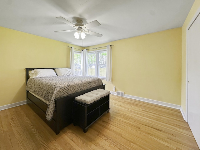 870 Lakeside Dr, Bridgeport, CT 06606 - bedroom with ceiling fan, baseboards, light wood-type flooring, and visible vents