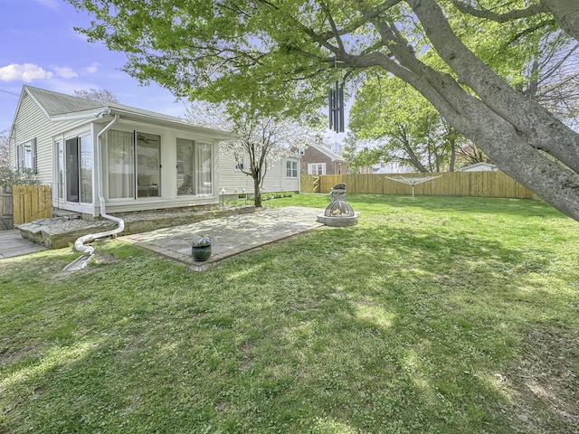 870 Lakeside Dr, Bridgeport, CT 06606 - view of yard with an outdoor fire pit, a patio area, and a fenced backyard