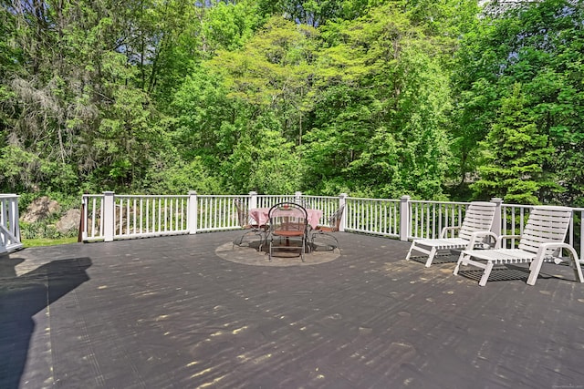 37 Shawnee Rd, Trumbull, CT 06611 - wooden terrace with outdoor dining area and a wooded view