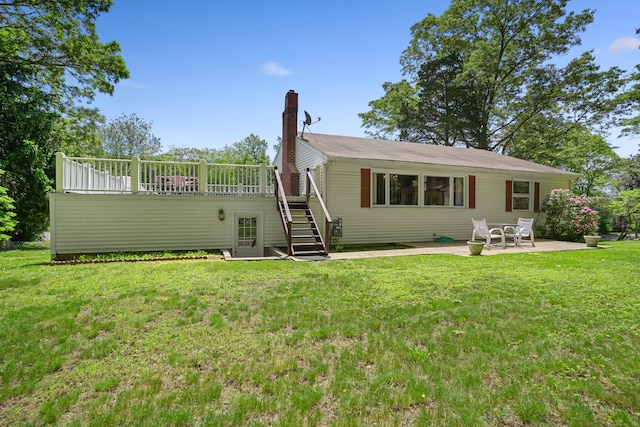 37 Shawnee Rd, Trumbull, CT 06611 - back of property with stairway, a chimney, a patio, a yard, and a deck