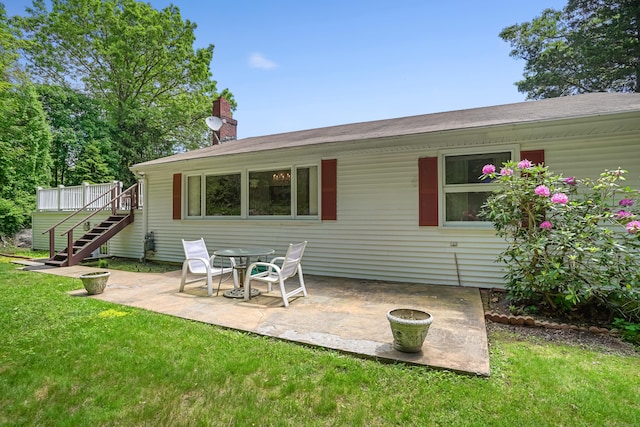 37 Shawnee Rd, Trumbull, CT 06611 - rear view of house with stairs, a yard, a patio, and a chimney
