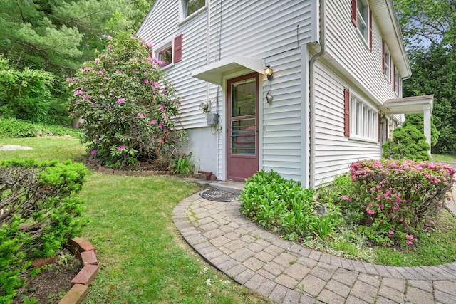 37 Shawnee Rd, Trumbull, CT 06611 - view of exterior entry with a lawn