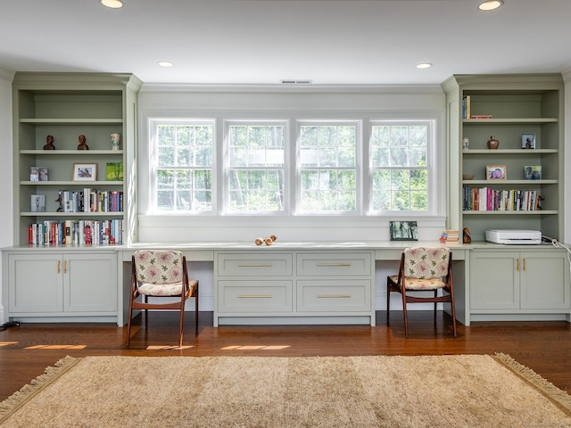 office area with built in desk, dark wood-style flooring, and recessed lighting