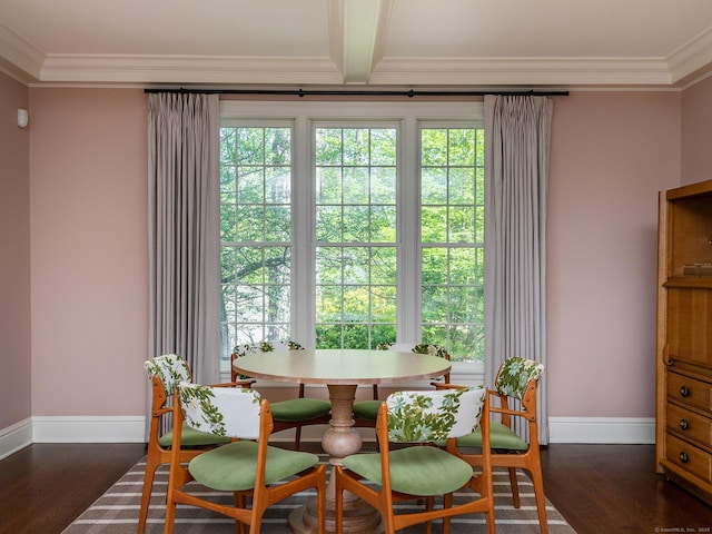 dining space with ornamental molding, baseboards, and dark wood-style floors