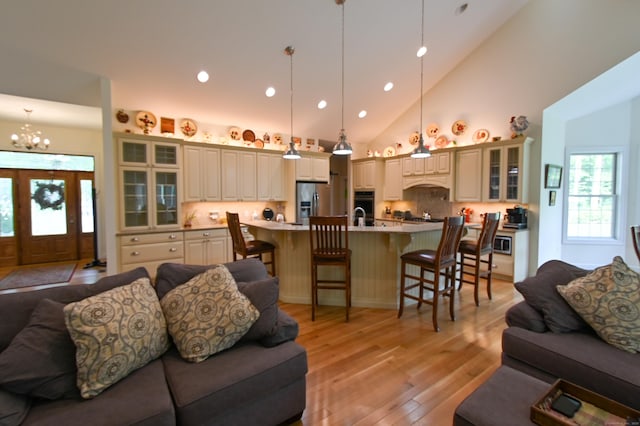 5 Kies Rd, Killingly, CT 06239 - living area featuring light wood-type flooring, a chandelier, recessed lighting, and high vaulted ceiling