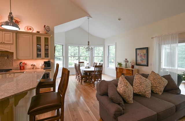 5 Kies Rd, Killingly, CT 06239 - living room featuring plenty of natural light, light wood-style flooring, and high vaulted ceiling