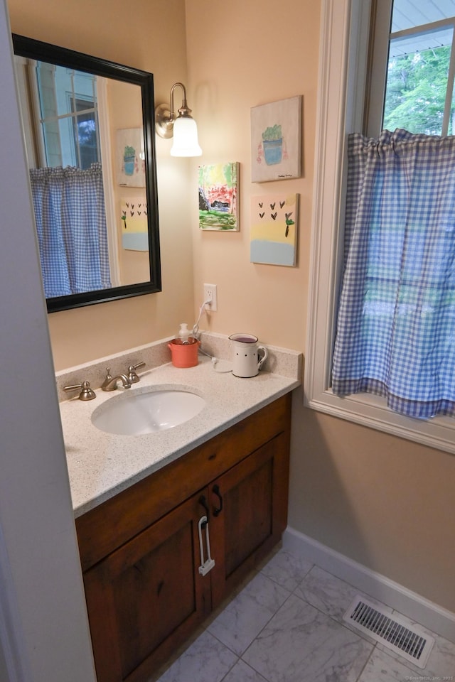 5 Kies Rd, Killingly, CT 06239 - bathroom with vanity and marble look tiles