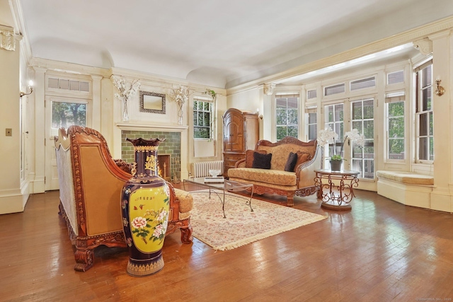 sunroom / solarium featuring radiator