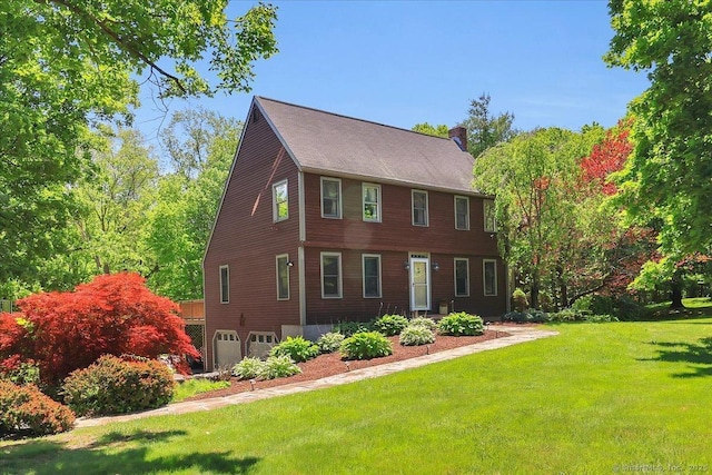 32 Powder Hill Rd, Middlefield, CT 06455 - view of front facade with a front yard, a garage, and a chimney