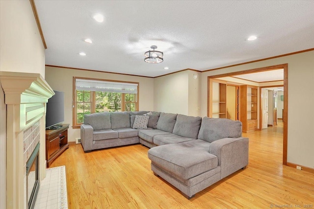32 Powder Hill Rd, Middlefield, CT 06455 - living room with ornamental molding, light wood-type flooring, baseboards, recessed lighting, and a textured ceiling