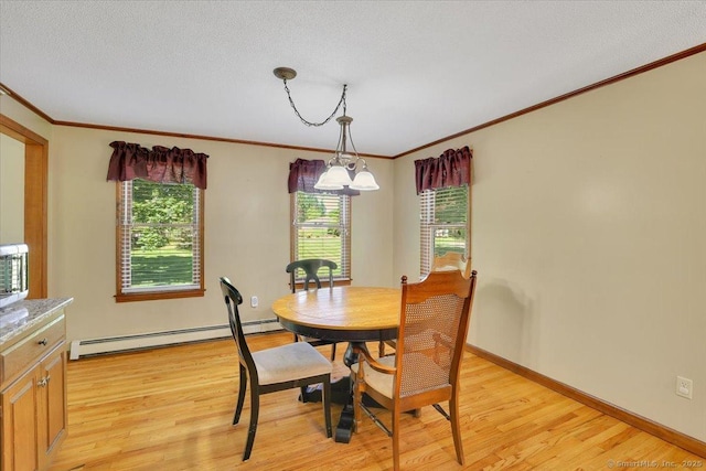32 Powder Hill Rd, Middlefield, CT 06455 - dining room with a baseboard radiator, light wood-type flooring, ornamental molding, and baseboards