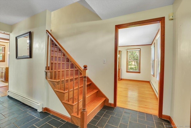 32 Powder Hill Rd, Middlefield, CT 06455 - stairway featuring baseboard heating, baseboards, tile patterned flooring, and a textured ceiling