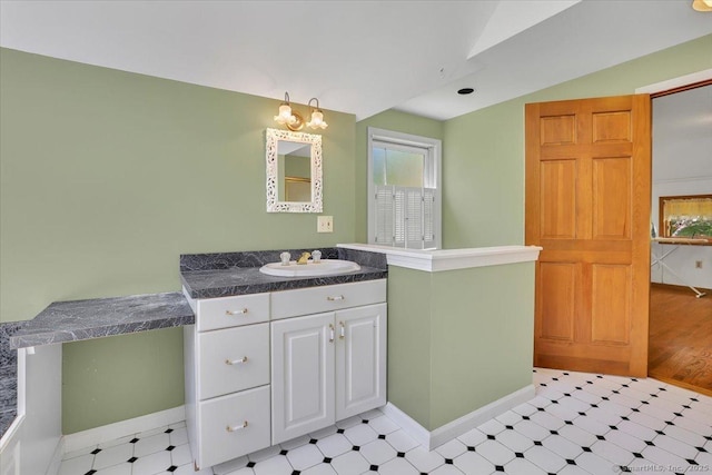 32 Powder Hill Rd, Middlefield, CT 06455 - bathroom featuring tile patterned floors, baseboards, vaulted ceiling, and vanity