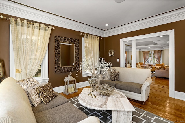 79 Comstock Hill Ave, Norwalk, CT 06850 - living area with ornamental molding, baseboards, wood finished floors, and recessed lighting