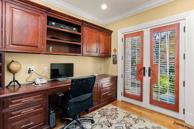 79 Comstock Hill Ave, Norwalk, CT 06850 - office featuring french doors, built in desk, crown molding, and light wood-style flooring