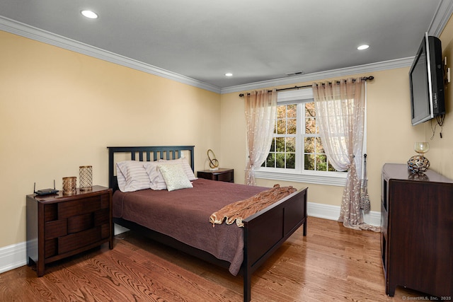 79 Comstock Hill Ave, Norwalk, CT 06850 - bedroom with crown molding, baseboards, wood finished floors, and recessed lighting