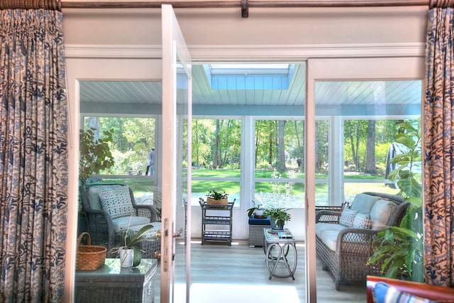11 Tall Pines Dr, Weston, CT 06833 - sunroom featuring a skylight and wood finished floors