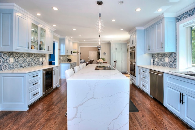11 Tall Pines Dr, Weston, CT 06833 - kitchen with stainless steel appliances, beverage cooler, dark wood-type flooring, a center island, and recessed lighting