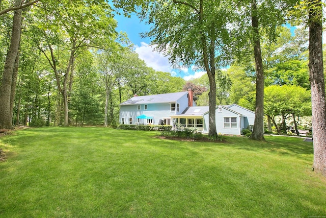 11 Tall Pines Dr, Weston, CT 06833 - rear view of property featuring a chimney and a lawn