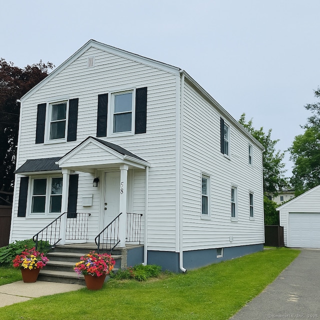 158 Louisiana Ave, Bridgeport, CT 06610 - view of front of home with a front lawn and an outdoor structure