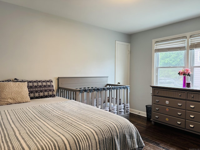 158 Louisiana Ave, Bridgeport, CT 06610 - bedroom featuring dark wood-style flooring and baseboards