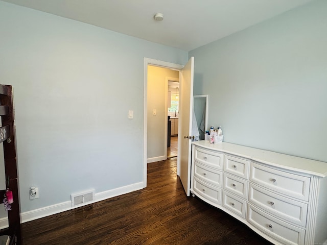 158 Louisiana Ave, Bridgeport, CT 06610 - bedroom featuring dark wood-type flooring and baseboards