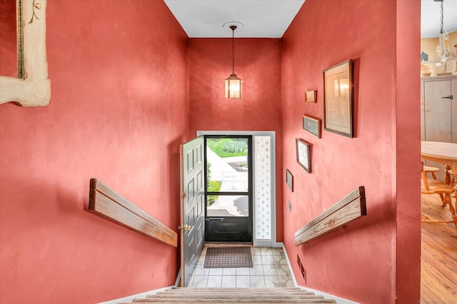 foyer entrance with baseboards