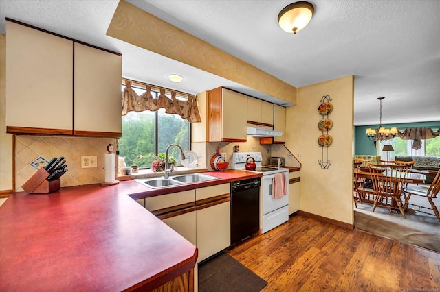 kitchen with dishwasher, a sink, white electric stove, under cabinet range hood, and a chandelier