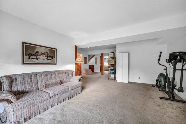 living area with carpet floors and baseboards