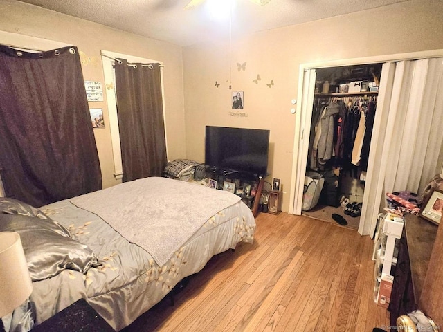 43 Westerly St, New Britain, CT 06053 - bedroom featuring hardwood / wood-style flooring, a closet, and a textured ceiling