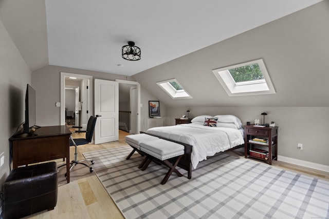 227 Sugar St, Newtown, CT 06470 - bedroom with a skylight, lofted ceiling, light wood-type flooring, and baseboards