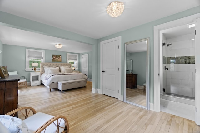 227 Sugar St, Newtown, CT 06470 - bedroom with light wood-type flooring and baseboards