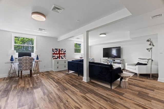 227 Sugar St, Newtown, CT 06470 - living area featuring wood finished floors, plenty of natural light, and baseboards