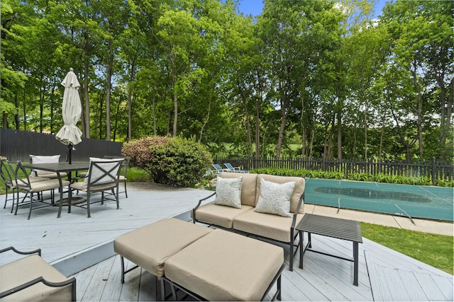 227 Sugar St, Newtown, CT 06470 - wooden deck with a fenced backyard and outdoor dining space