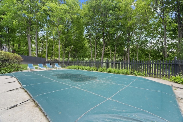 227 Sugar St, Newtown, CT 06470 - view of basketball court with fence and view of scattered trees