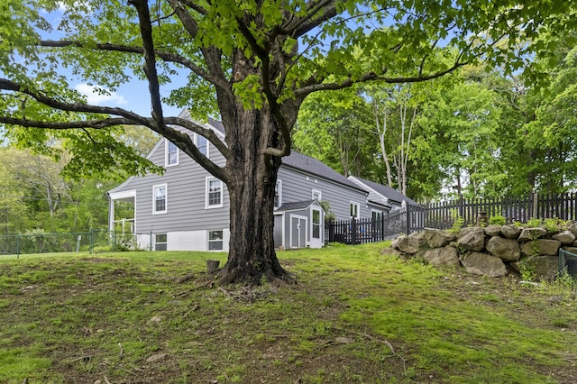 227 Sugar St, Newtown, CT 06470 - view of yard featuring a shed and an outdoor structure