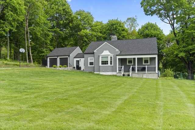 227 Sugar St, Newtown, CT 06470 - rear view of property featuring covered porch, a garage, roof with shingles, a chimney, and an outdoor structure